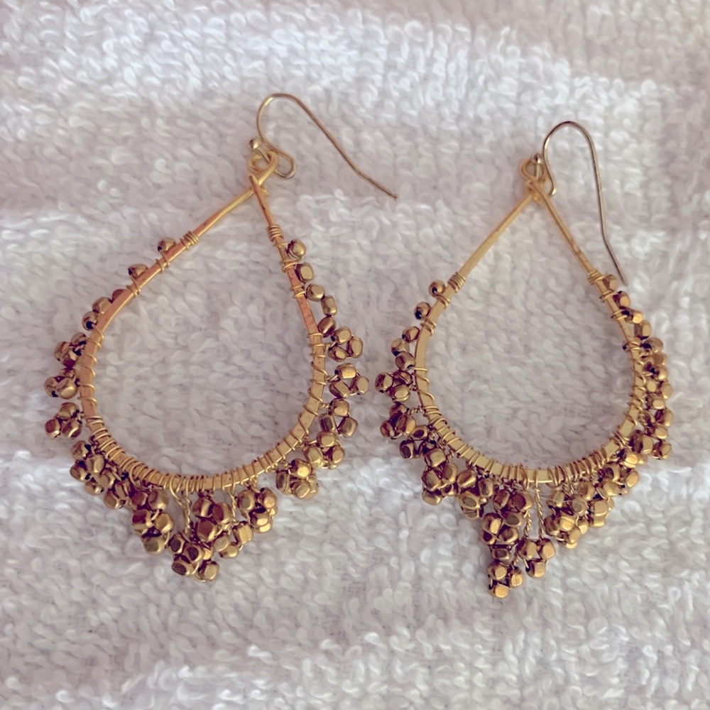 Gold tone dangling wire earrings